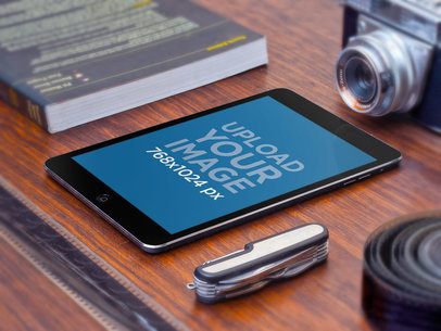 Mockup of an iPad Mini in a Vintage Setting