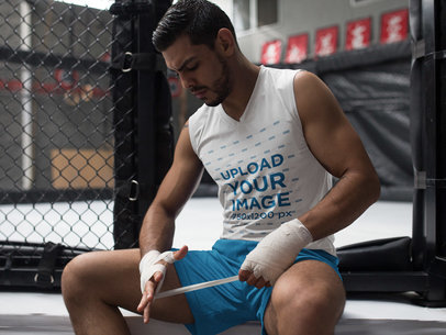 Sleeveless Shirt Mockup of an MMA Student Wrapping his Hands