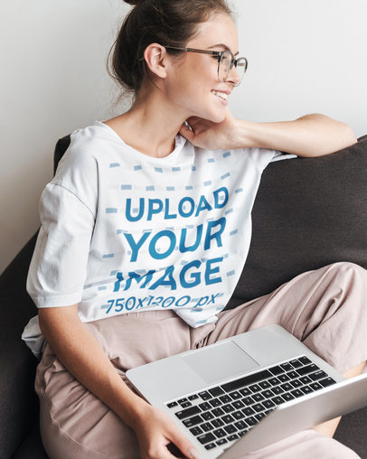 Mockup of a Woman Wearing a Loose T-Shirt at Home