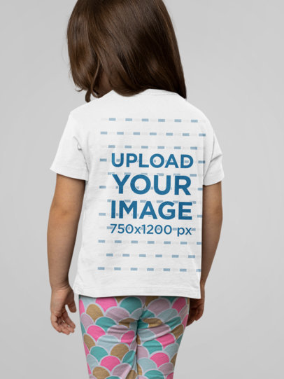 Back-View Mockup of a Little Girl in a Bella Canvas T-Shirt 