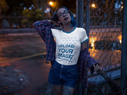 Hispanic Woman Wearing a Ringer Tee Mockup at Night