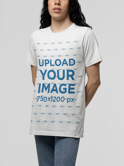 Basic Bella Canvas Tee Mockup of a Woman with Long Hair at a Studio