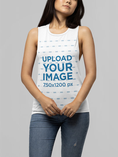 Bella Canvas Sleeveless Shirt Mockup Featuring a Woman with Long Hair at a Studio