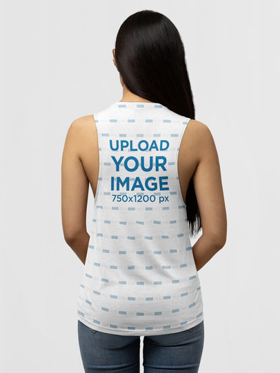 Back-View Mockup of a Woman Wearing a Bella Canvas Tank Top at a Studio