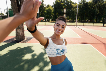 Sports Bra Mockup of a Woman Doing a High-Five to Another Person m15714 r-el2