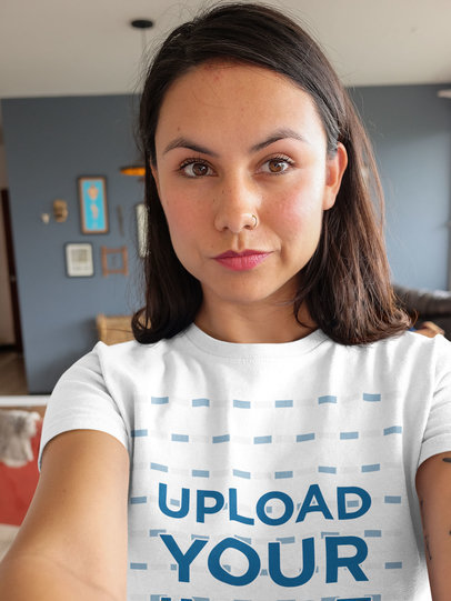 Selfie Mockup of a Woman Wearing a Tshirt While at her Livingroom
