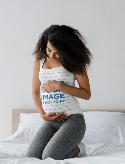 Mockup Featuring a Pregnant Woman Wearing a Tank Top in Her Bedroom