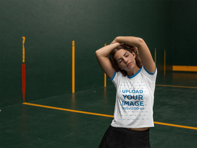 Woman Wearing a Ringer Tee Mockup While Relaxing Indoors