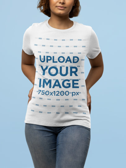 Mockup of a Woman Posing in a Studio With a Bella Canvas T-Shirt