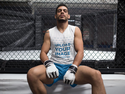 Mockup of an MMA Apprentice Wearing a Sleeveless Shirt While Outside the Cage