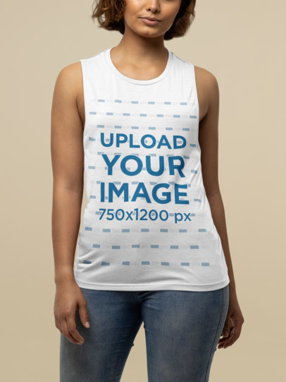 Bella Canvas Sleeveless Tee Mockup of a Woman with Curly Hair at a Studio