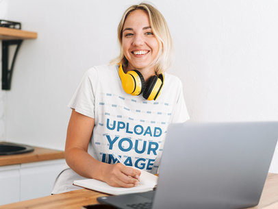 T-Shirt Mockup of a Woman Studying Online m12615-r-el2