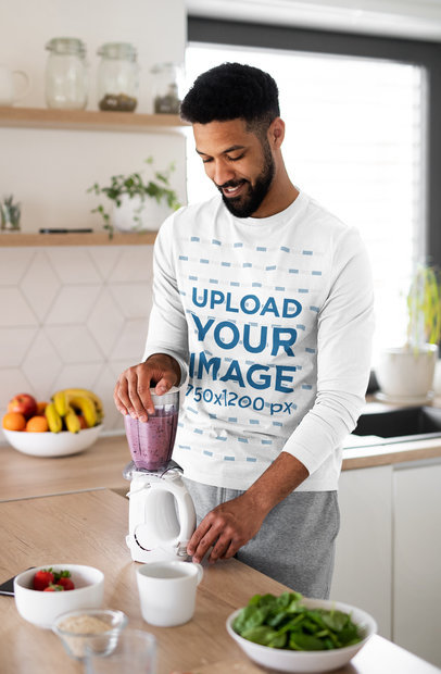 Long Sleeve Tee Mockup Featuring a Bearded Man Preparing a Smoothie