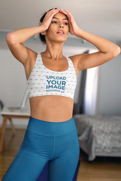 Sports Bra Mockup Featuring a Tired Young Woman at Home