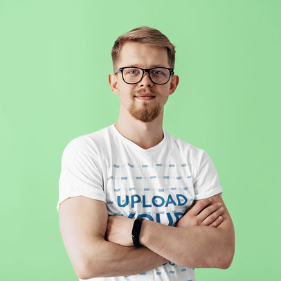 T-Shirt Mockup of a Man with Glasses Crossing His Arms m9081-r-el2