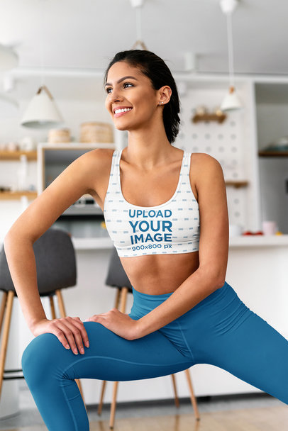 Sports Bra Mockup Featuring a Smiling Woman Stretching 
