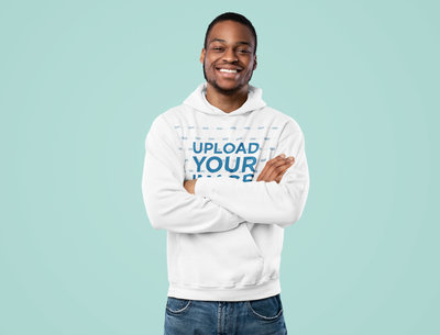 Mockup Featuring a Happy Man Wearing a Hoodie Against a Plain Backdrop