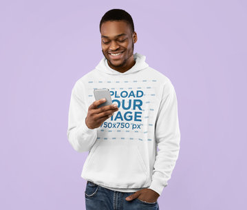 Pullover Hoodie Mockup Featuring a Man Reading a Funny Message at a Studio