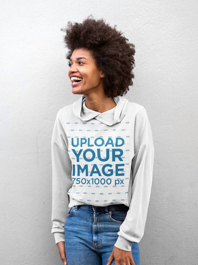 Hoodie Mockup of a Woman With an Afro in Front of a White Wall