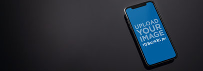 iPhone 11 Pro Mockup Lying on a Gray Smooth Surface