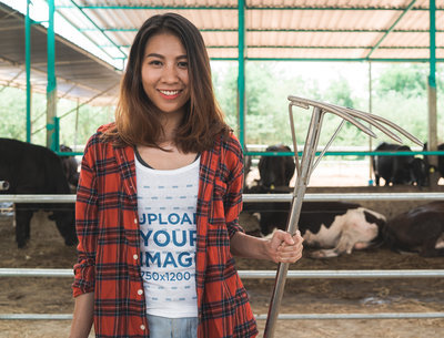 Tank Top Mockup Featuring a Happy Woman Posing in a Dairy Farm m8759 r-el2