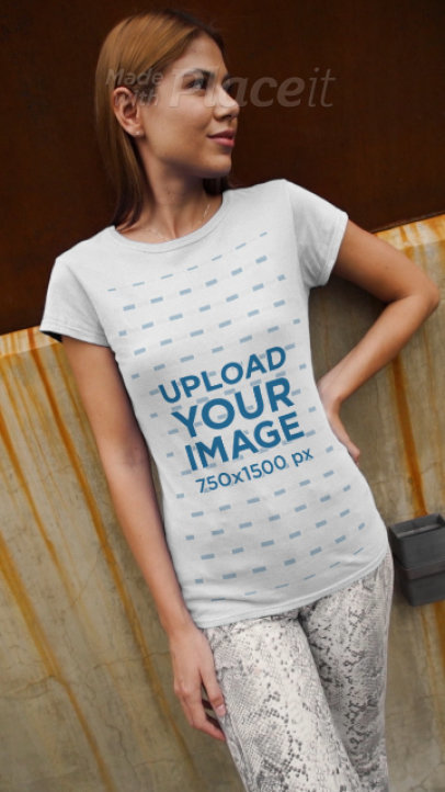 Video of a Woman Wearing a T-Shirt and Animal-Print Pants