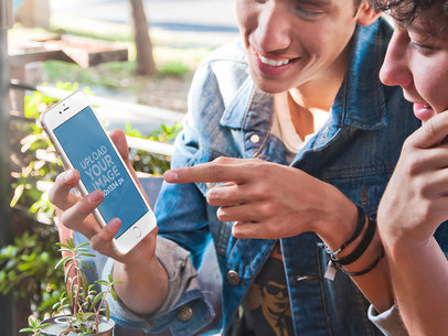 iPhone Mockup of Two Friends Holding an iPhone 6