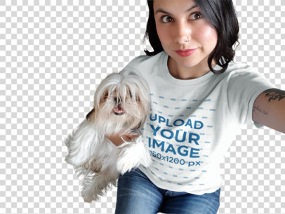 Transparent Mockup of a Pretty Woman Wearing a Round Neck Tee While Taking a Selfie with her Dog