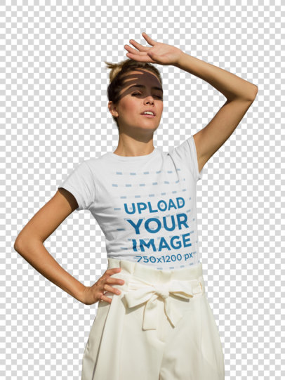 Transparent T-Shirt Mockup of a Woman in a Garden Blocking the Sun from Her Eyes