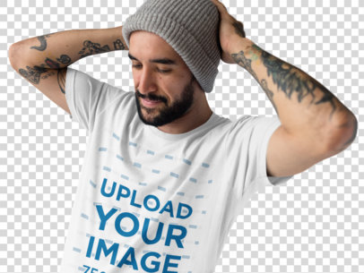 Transparent Mockup of a Man Fixing Up his Beanie While Wearing a T-Shirt at a Studio