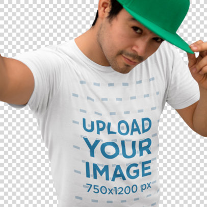 Transparent Young Man Wearing a Round Neck Tee Mockup and a Hat While Taking a Selfie