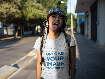 Woman Being Rude While Wearing a T-Shirt Mockup in the Street