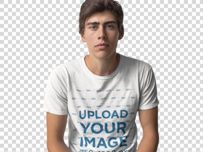 Transparent Trendy Guy Sitting in a Studio Wearing a T-Shirt Mockup