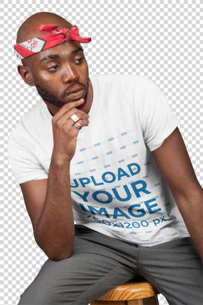 Transparent Mockup Featuring a Man Wearing a T-Shirt at a Studio in a Cool Pose