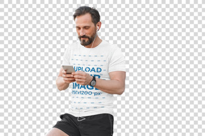 Transparent T-Shirt Mockup of a Middle-Aged Man Checking His Mobile