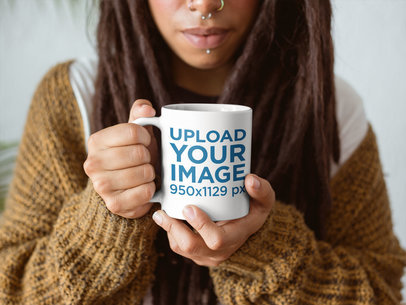 Closeup Mockup of a Woman with Locks Holding a Coffee Cup Indoors