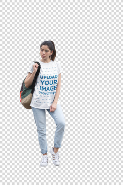 Transparent Mockup of a Casual Young Woman Wearing a Unisex Tee in the City