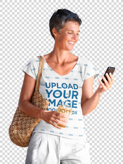Transparent Mockup of a Middle-Aged Woman with a Sublimated V-Neck Tee Walking on the Street