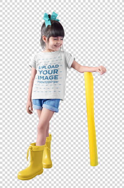 Transparent Little Girl Wearing a T-Shirt Mockup a Hair Ribbon and Rain Boots in a Bicolor Room a19475