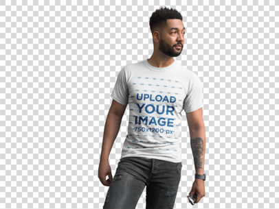 Transparent Front View T-Shirt Mockup Featuring a Man with a Beard Against a Concrete Wall and a Window