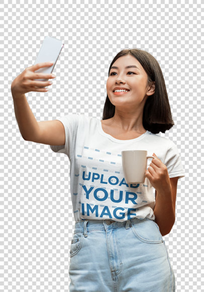 Transparent Tee Mockup of a Woman Taking a Selfie at Her Kitchen