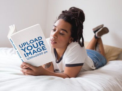 Mockup of a Woman with Locs Reading a Book in Bed a17302