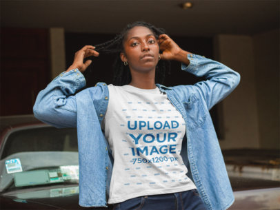 Woman Playing with Her Hair While Wearing a Tshirt Mockup Against a Car