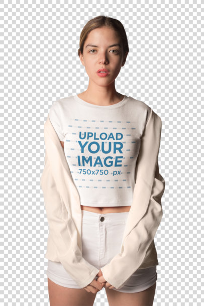 Transparent Mockup of a Woman Wearing a T-Shirt Against a White Wall