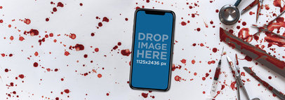 Halloween iPhone X Mockup on a Butcher Surgery Table a17374