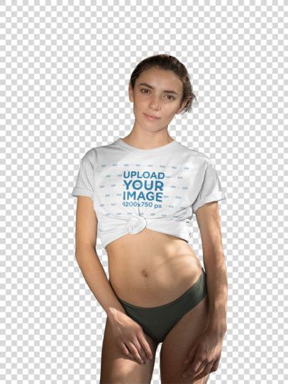 Transparent Mockup of a Woman Wearing a Knotted T-Shirt by the Pool