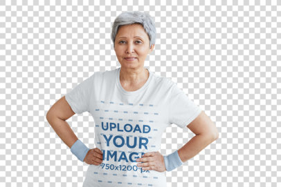 Transparent T-Shirt Mockup of a Short-Haired Senior Woman Posing With Her Arms on Her Waist 