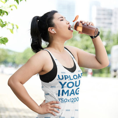 Sublimated Tank Top Mockup of a Woman Taking a Break from Working Out in the Street m15263-r-el2