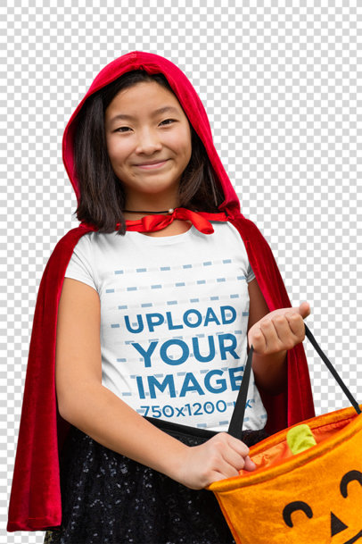 Transparent T-Shirt Mockup of a Happy Girl in a Red Coat Holding a Pumpkin Bag