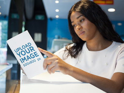 Pretty Black Girl Reading a Book Mockup Alone a17330